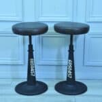 a pair of vintage italian cast iron necchi adjustable stools