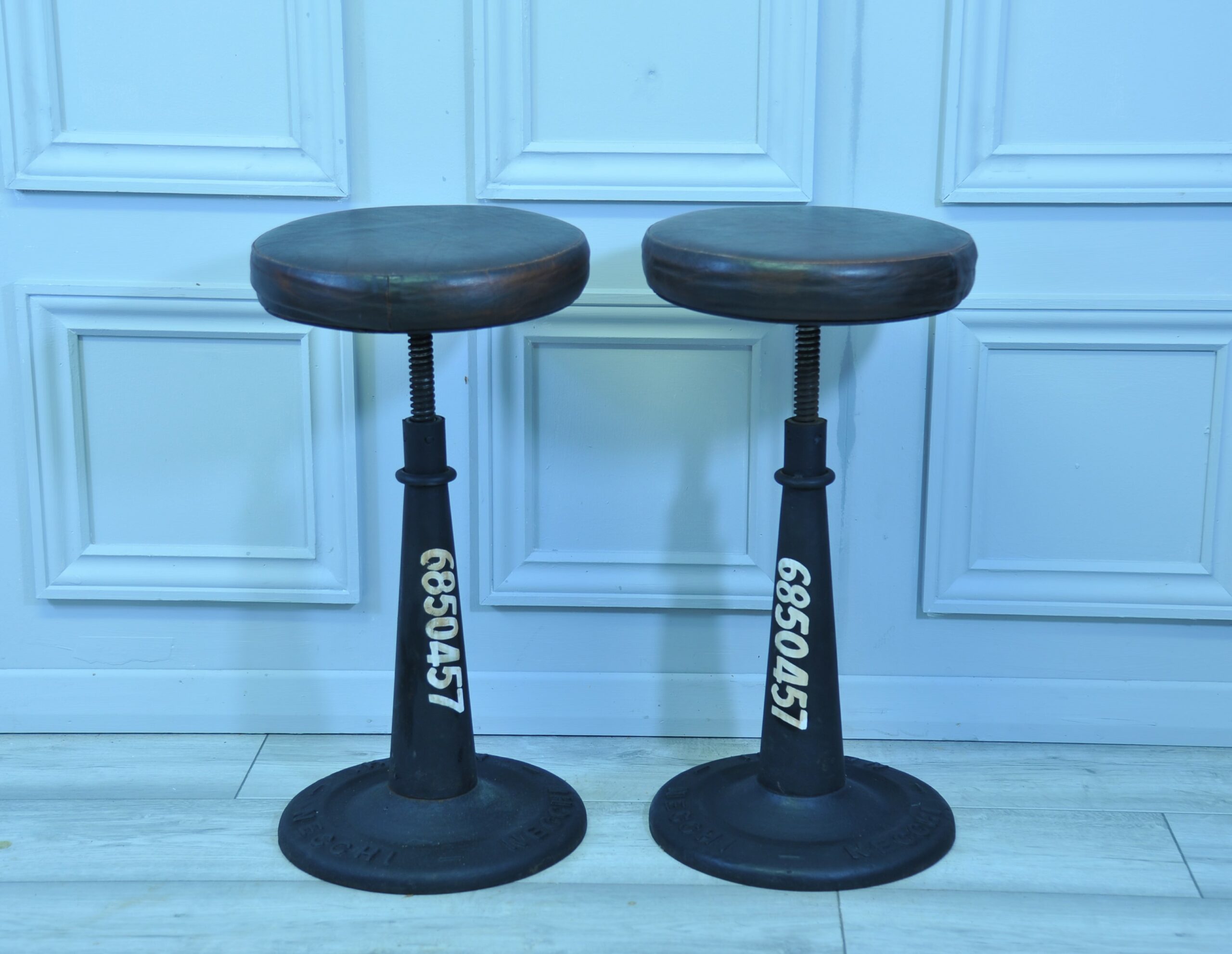 a pair of vintage italian cast iron necchi adjustable stools