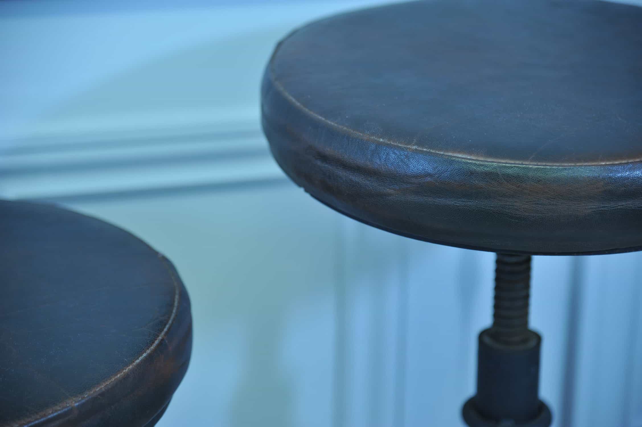 a pair of vintage italian cast iron necchi adjustable stools