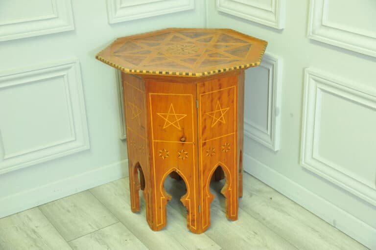 an antique vintage hexagonal satinwood side table