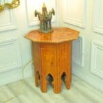 an antique vintage hexagonal satinwood side table