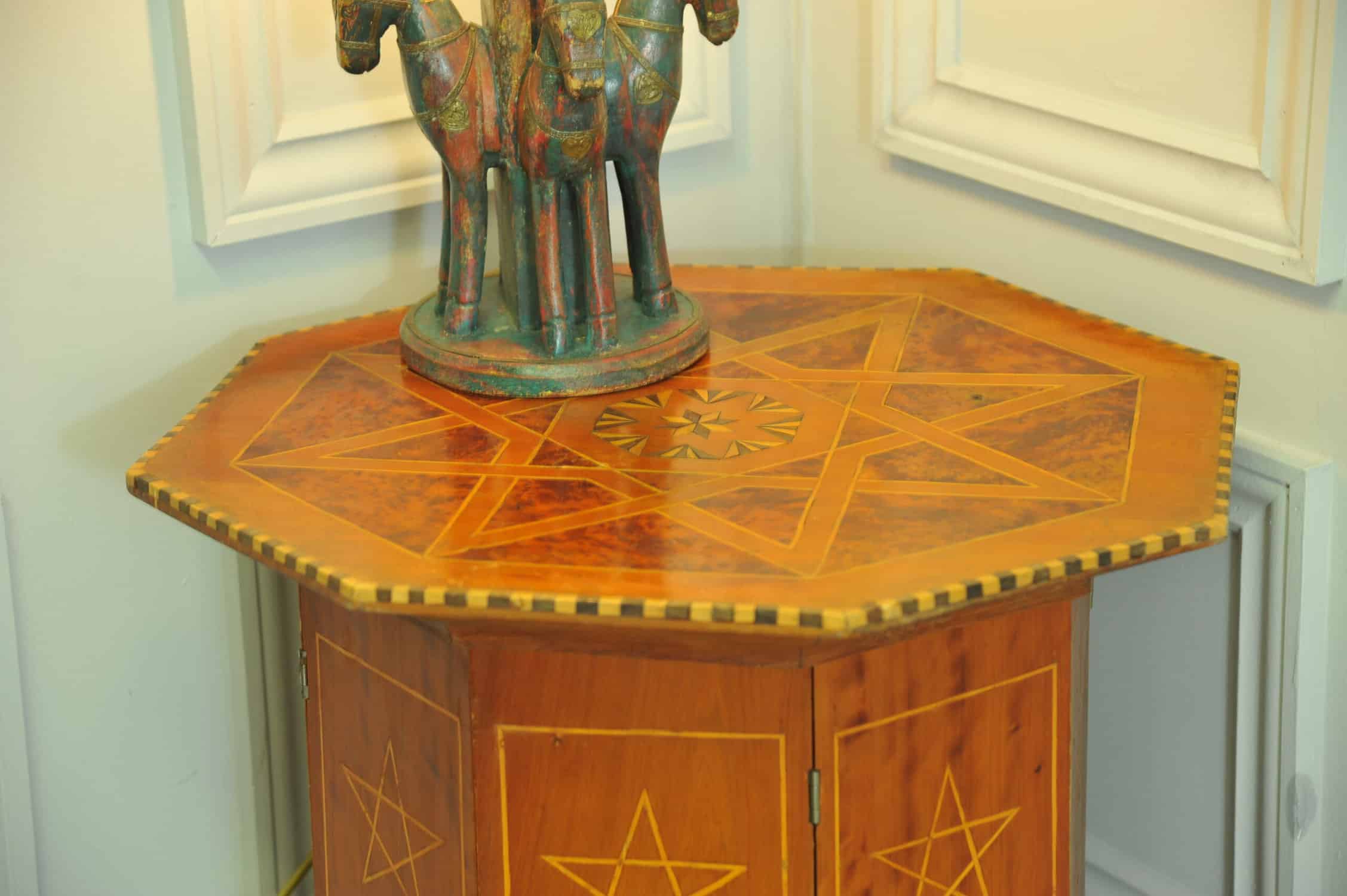 an antique vintage hexagonal satinwood side table