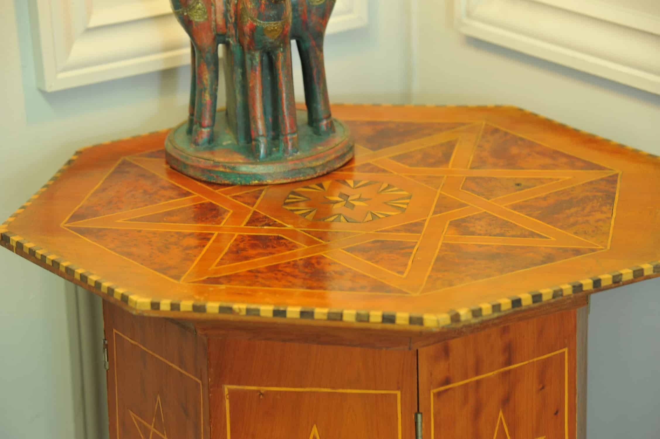 an antique vintage hexagonal satinwood side table