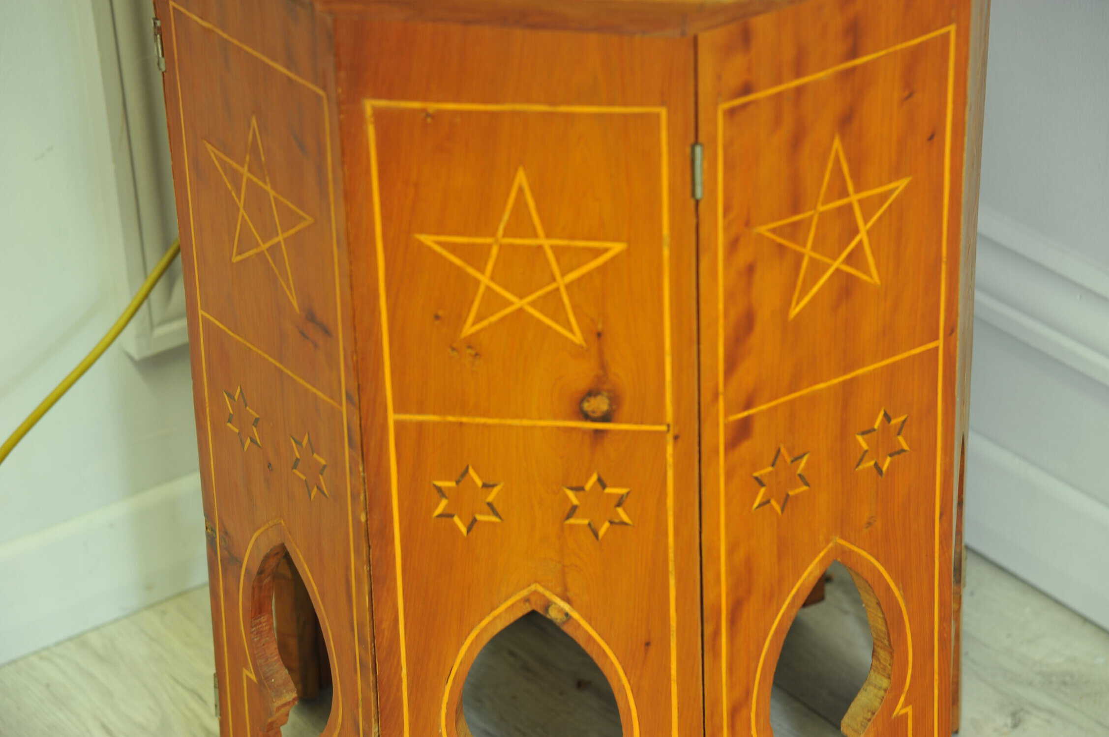 an antique vintage hexagonal satinwood side table