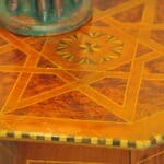 an antique vintage hexagonal satinwood side table