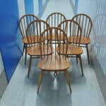 a set of six vintage ercol windsor hoop back model 370 chairs