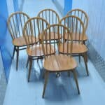 a set of six vintage ercol windsor hoop back model 370 chairs