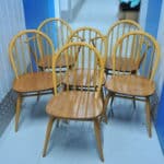 a set of six vintage ercol windsor hoop back chairs including two carvers