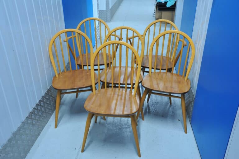 a set of six vintage ercol windsor hoop back chairs including two carvers