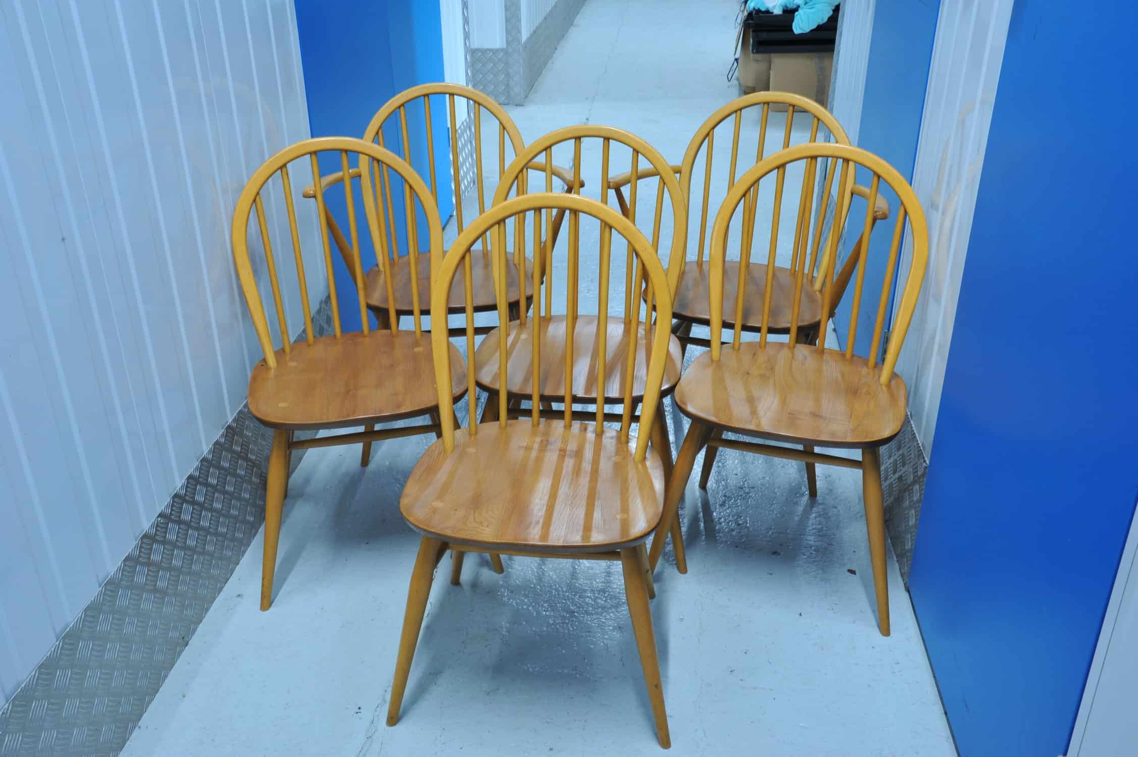 a set of six vintage ercol windsor hoop back chairs including two carvers