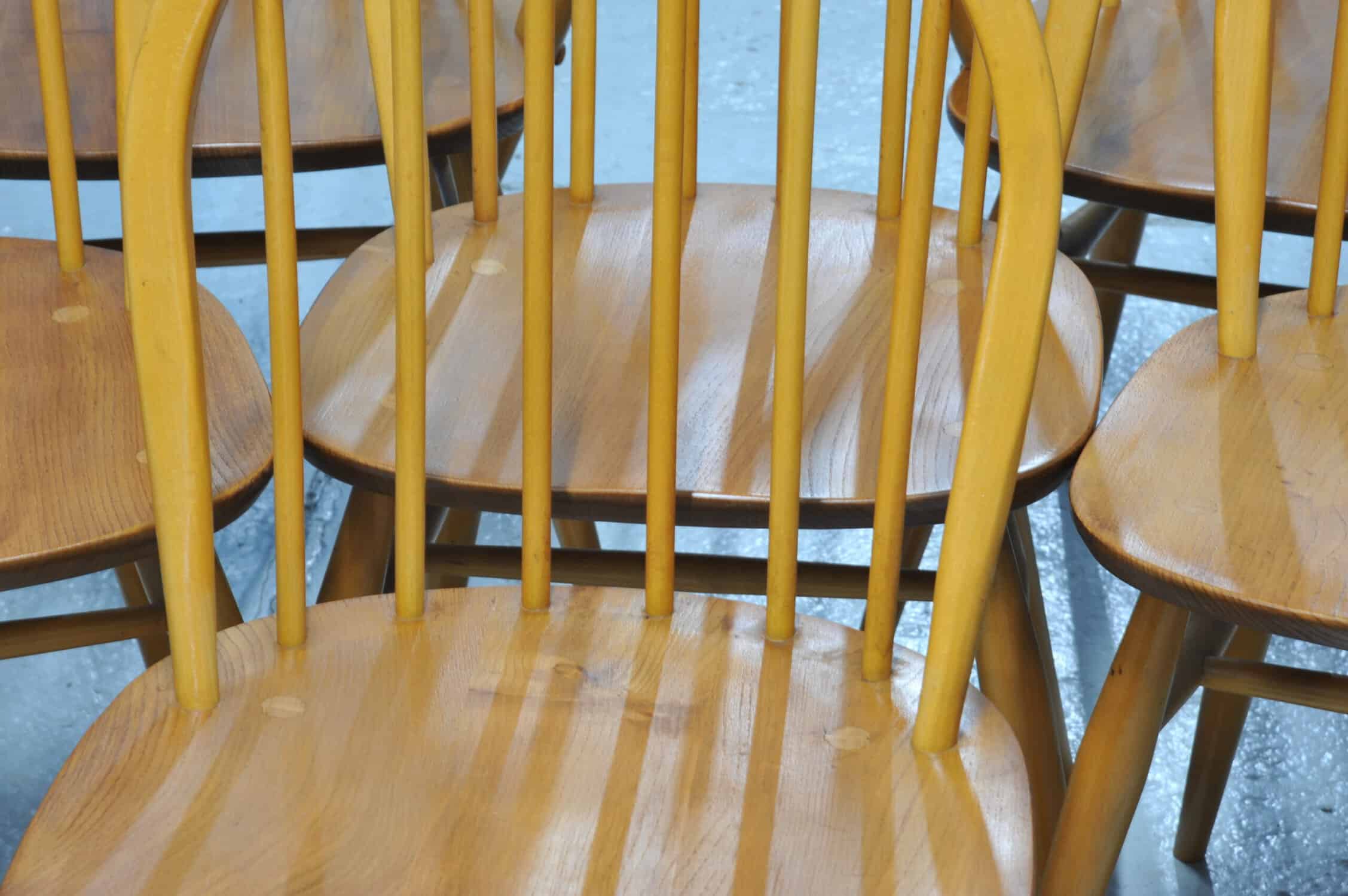 a set of six vintage ercol windsor hoop back chairs including two carvers