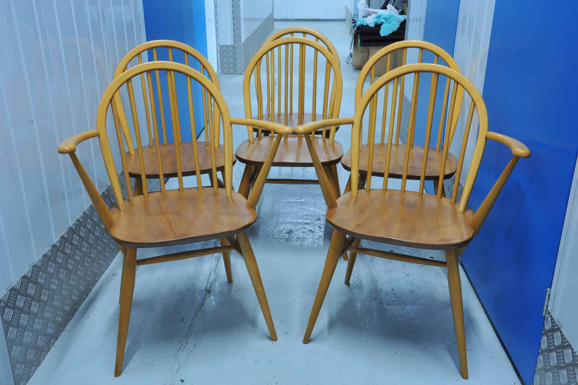 a set of six vintage ercol windsor hoop back chairs including two carvers