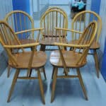 a set of six vintage ercol windsor hoop back chairs including two carvers