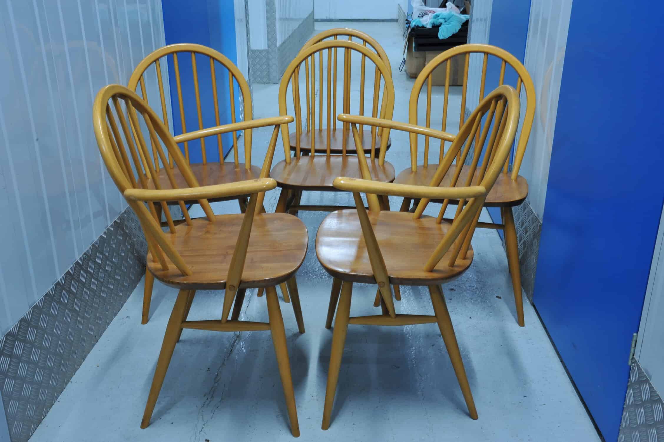 a set of six vintage ercol windsor hoop back chairs including two carvers