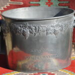 Vintage 1960s Moët & Chandon pewter champagne ice bucket with grapevine relief and ring handles