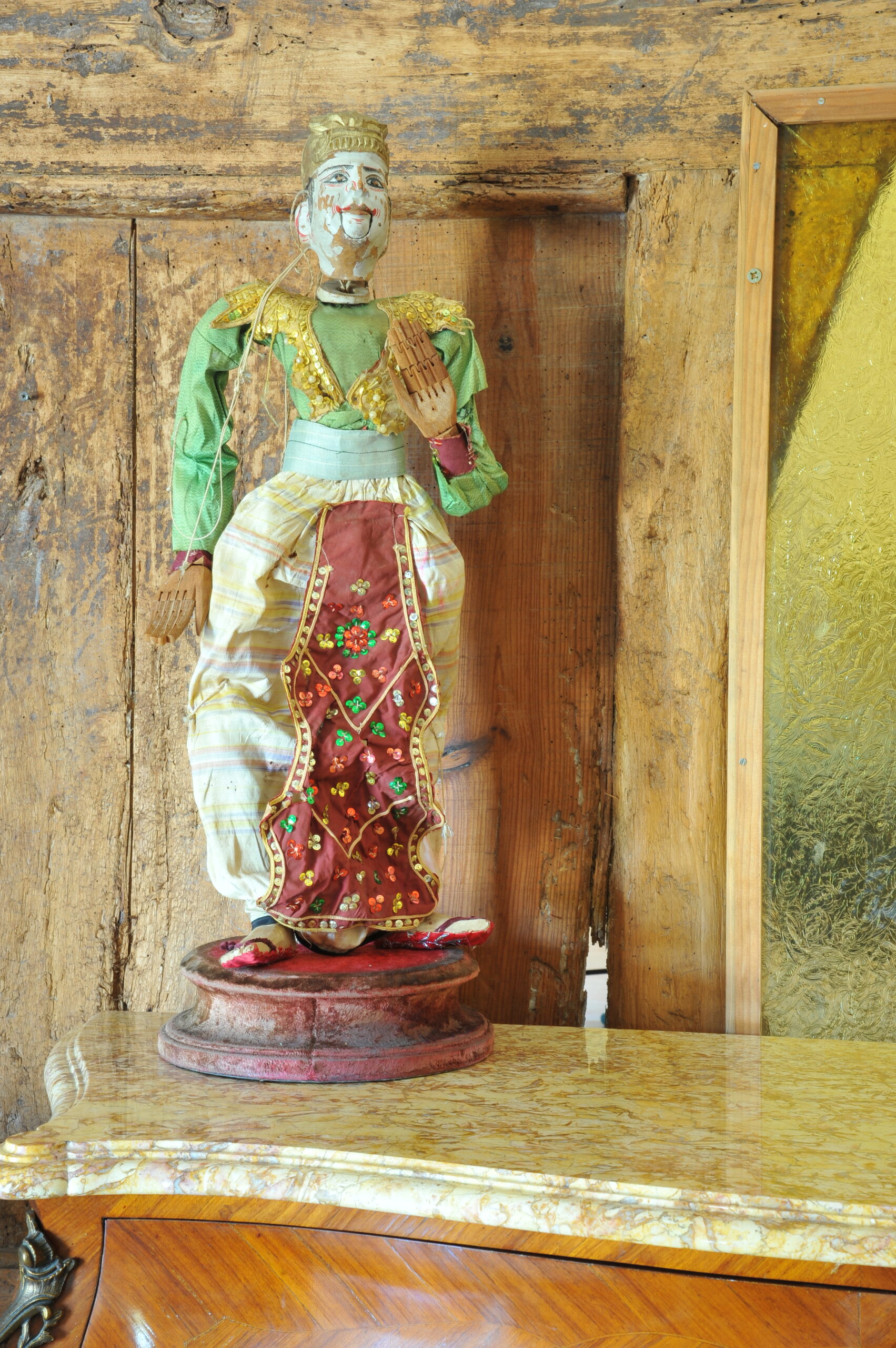 an antique middle eastern puppet