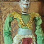 an antique middle eastern puppet