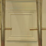 a pair of mid c swivel bar stools in solid pewter