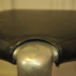 a pair of mid c swivel bar stools in solid pewter