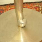 a pair of mid c swivel bar stools in solid pewter