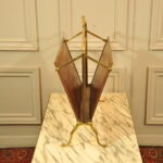 a vintage french folding brass paper rack attributable to maison bagues