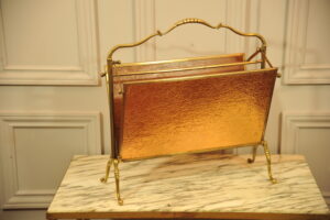 a vintage french folding brass paper rack attributable to maison bagues