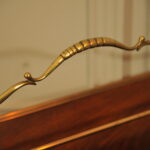 a vintage french folding brass paper rack attributable to maison bagues