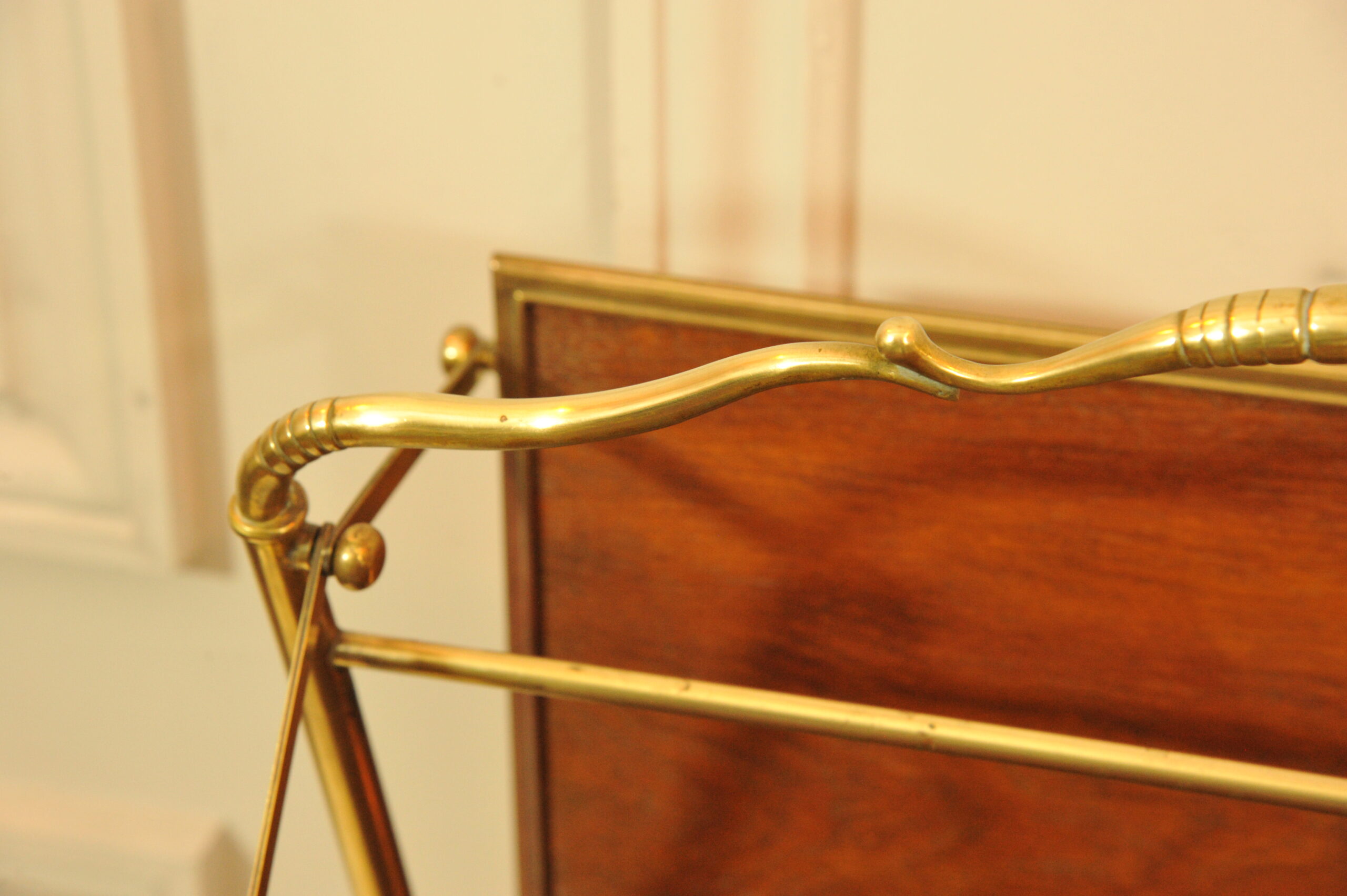 a vintage french folding brass paper rack attributable to maison bagues