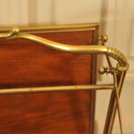 a vintage french folding brass paper rack attributable to maison bagues
