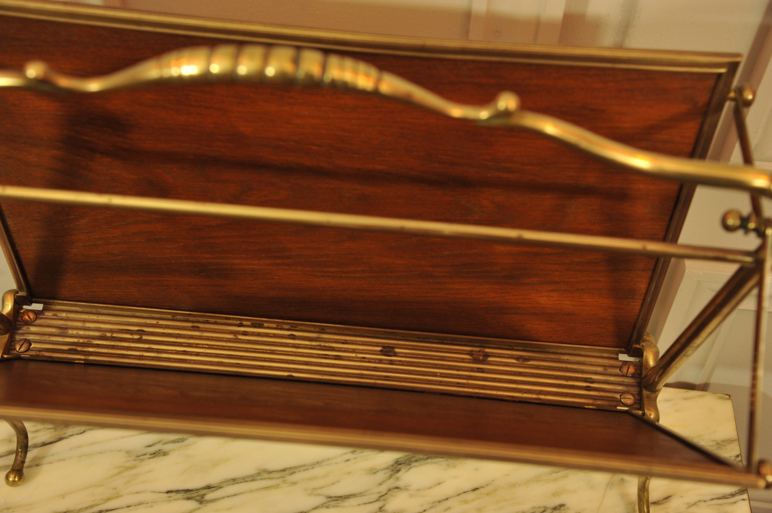 a vintage french folding brass paper rack attributable to maison bagues