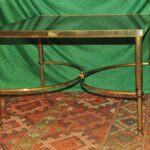 a vintage french mid c maison jansen brass and glass table