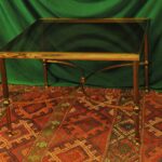 a vintage french mid c maison jansen brass and glass table