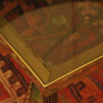 a vintage french mid c maison jansen brass and glass table
