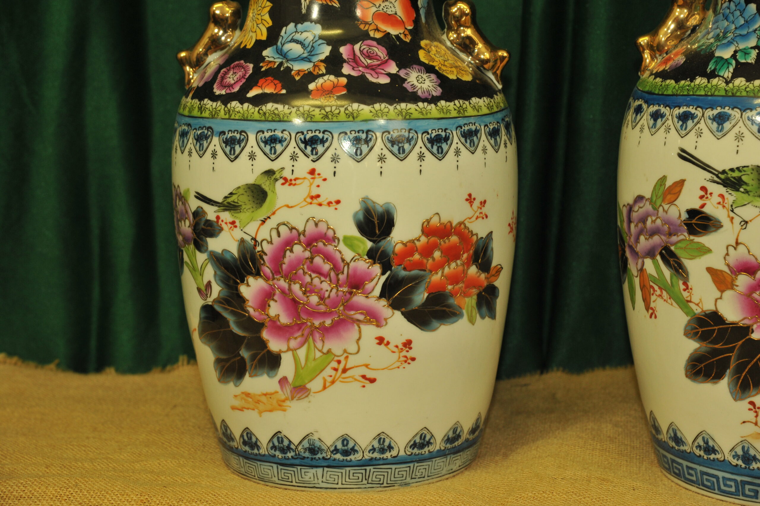a pair of vintage chinese foo dog vases