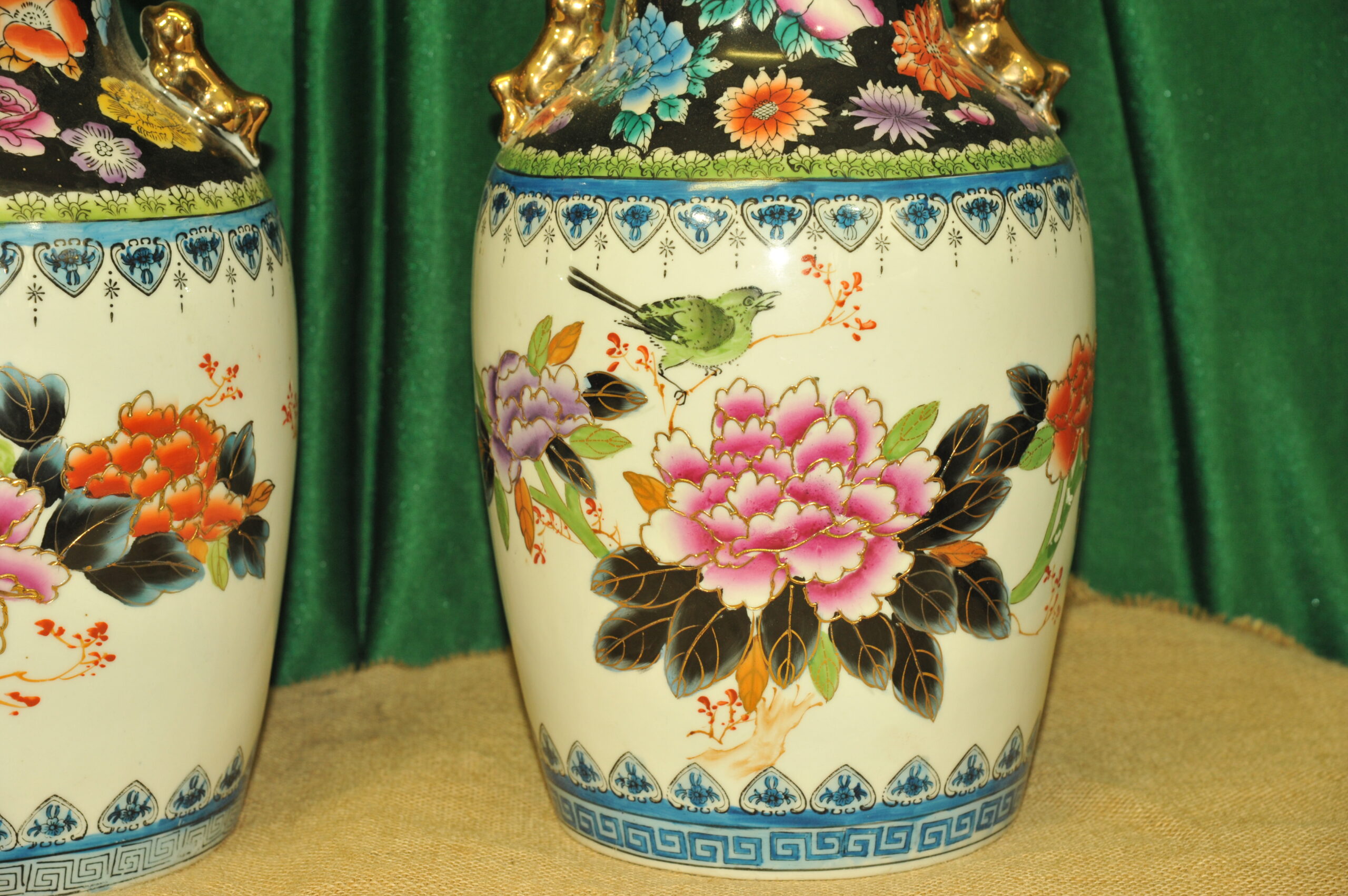 a pair of vintage chinese foo dog vases