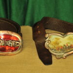 a pair of vintage collectible dsquared leather belts