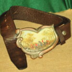 a pair of vintage collectible dsquared leather belts