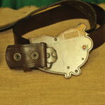 a pair of vintage collectible dsquared leather belts
