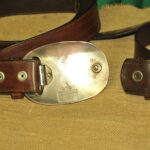 a pair of vintage collectible dsquared leather belts