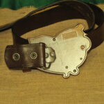 a pair of vintage collectible dsquared leather belts