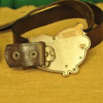 a pair of vintage collectible dsquared leather belts