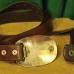 a pair of vintage collectible dsquared leather belts