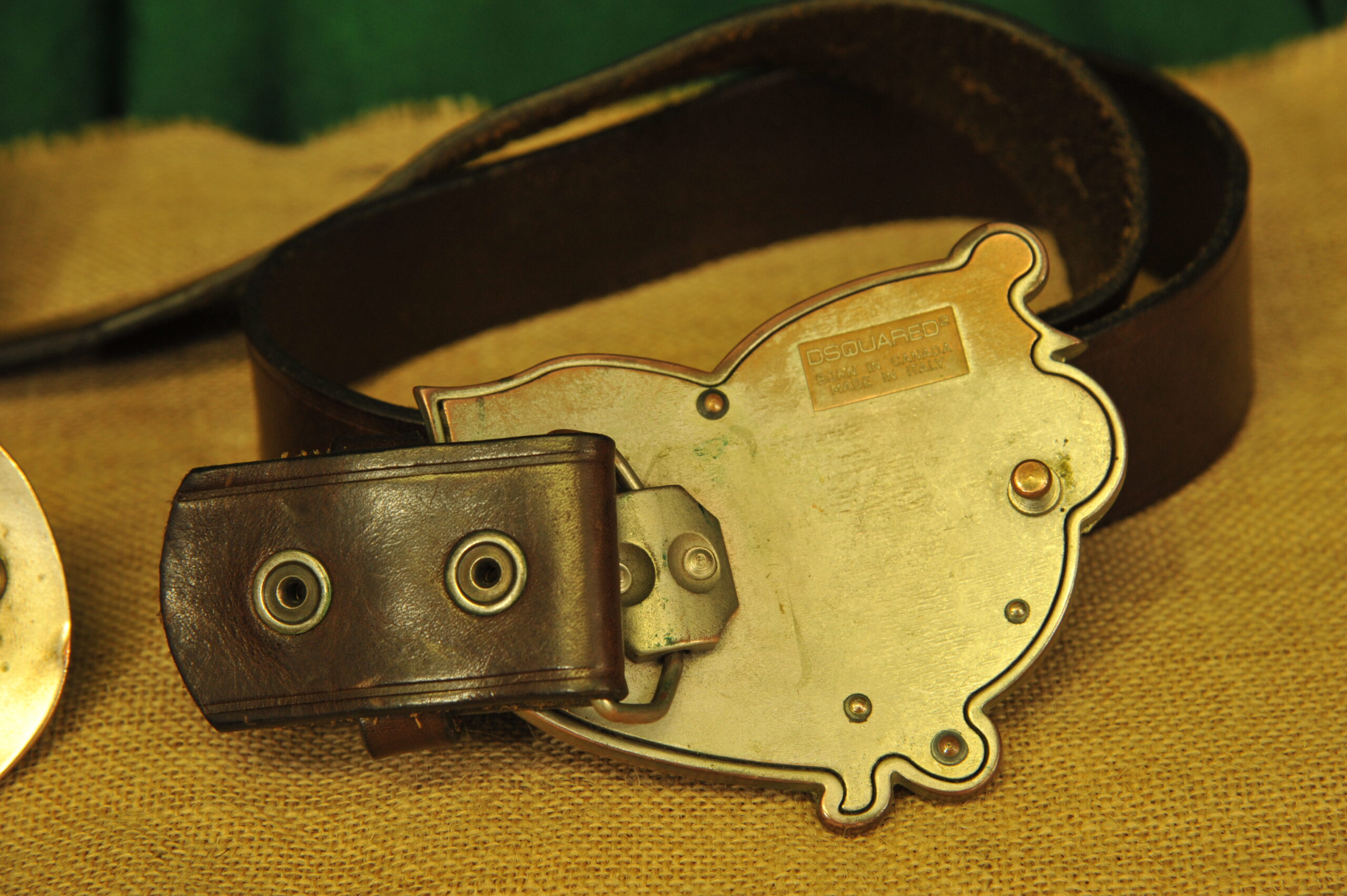 a pair of vintage collectible dsquared leather belts