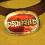 a pair of vintage collectible dsquared leather belts