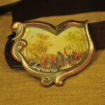 a pair of vintage collectible dsquared leather belts