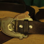 a pair of vintage collectible dsquared leather belts
