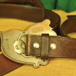 a pair of vintage collectible dsquared leather belts