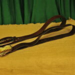 a pair of vintage collectible dsquared leather belts
