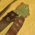 a pair of vintage collectible dsquared leather belts