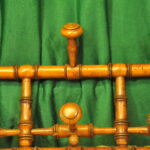 a vintage french faux bamboo coat rack